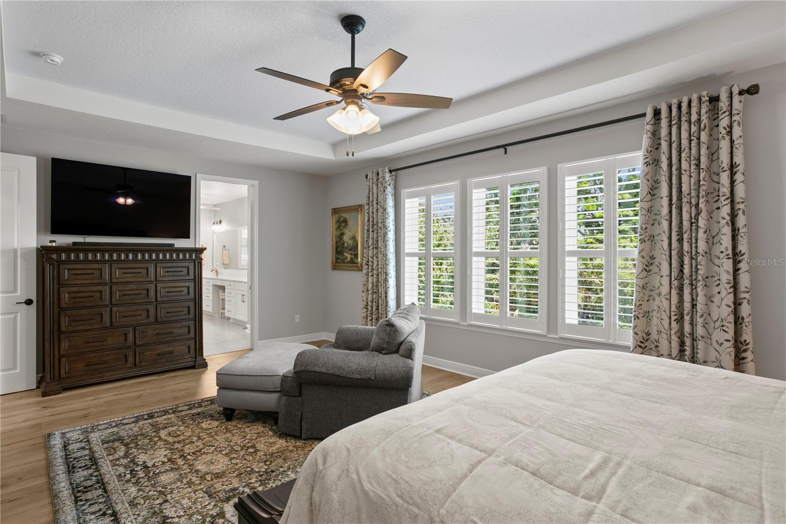 This primary suite runs the entire width of the house.
