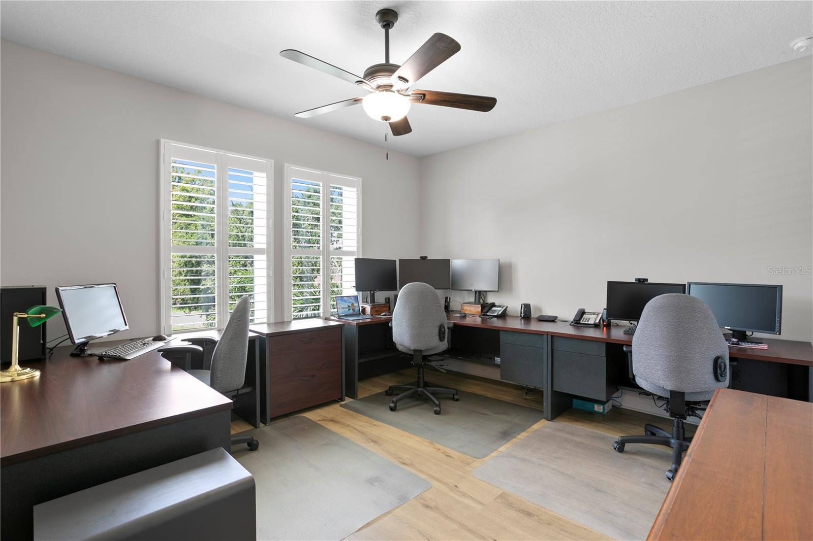 This large bedroom is currently used as an office. Bonus! It has an en suite bathroom!