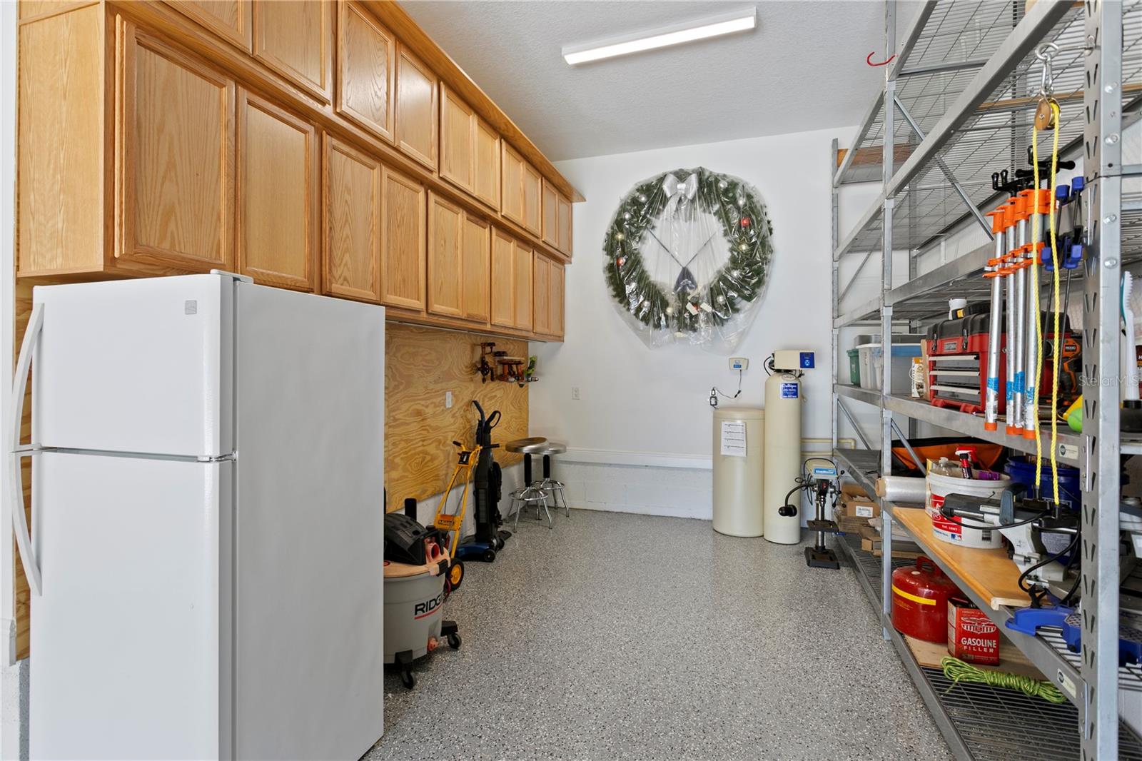 Storage, storage and more storage! The extra refrigerator will come in handy! Commercial grade shelving and cabinets keep everything organized.