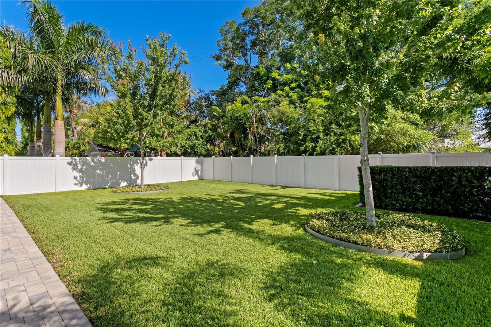 Brick pavers surround the exterior of the home, making an easy pathway.