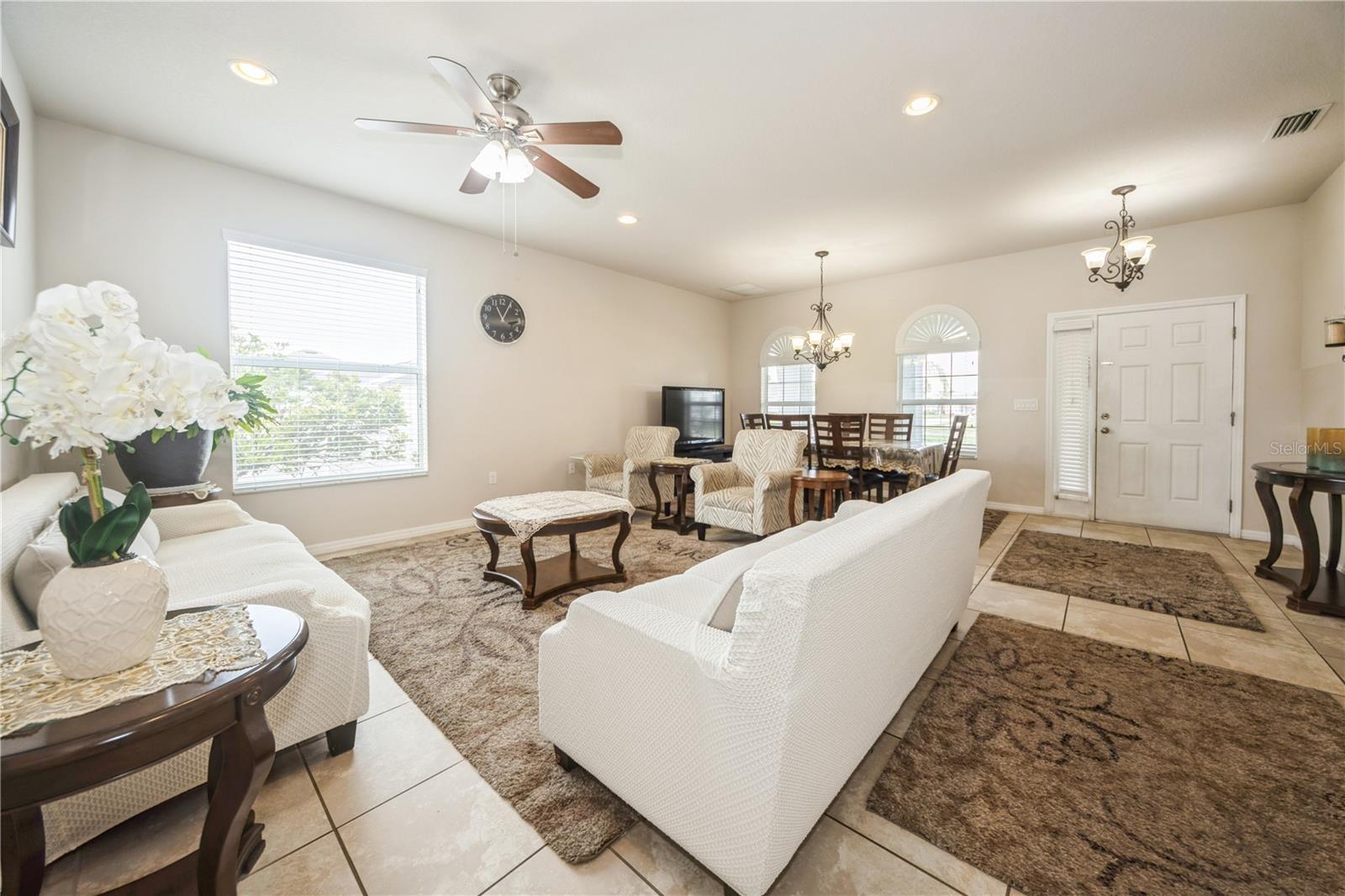 Open family room adjoining kitchen and dining areas