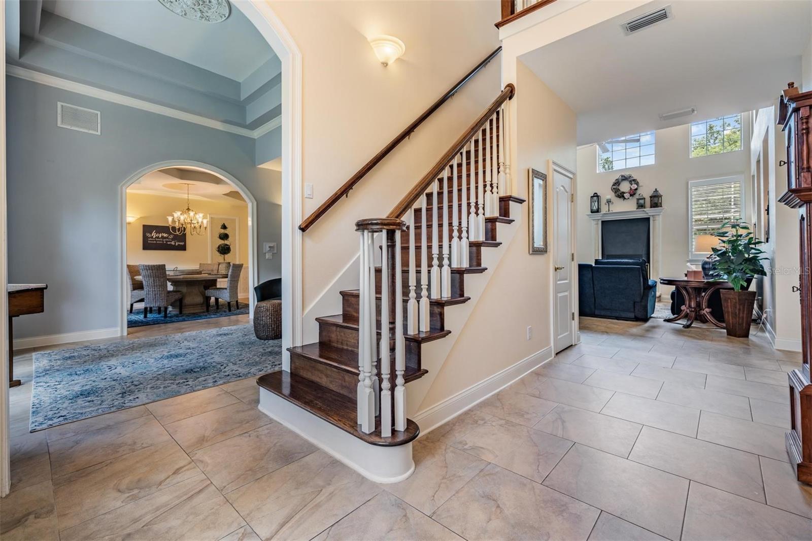 impressive spindle staircase at entryway