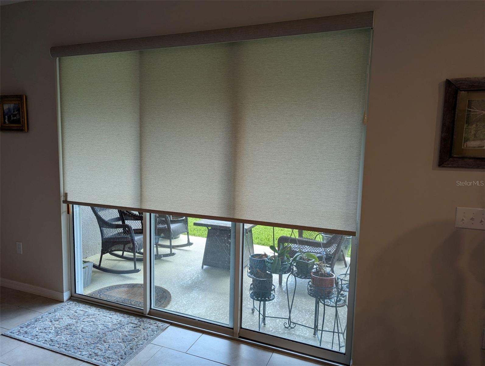 Electric blind on triple slider for privacy