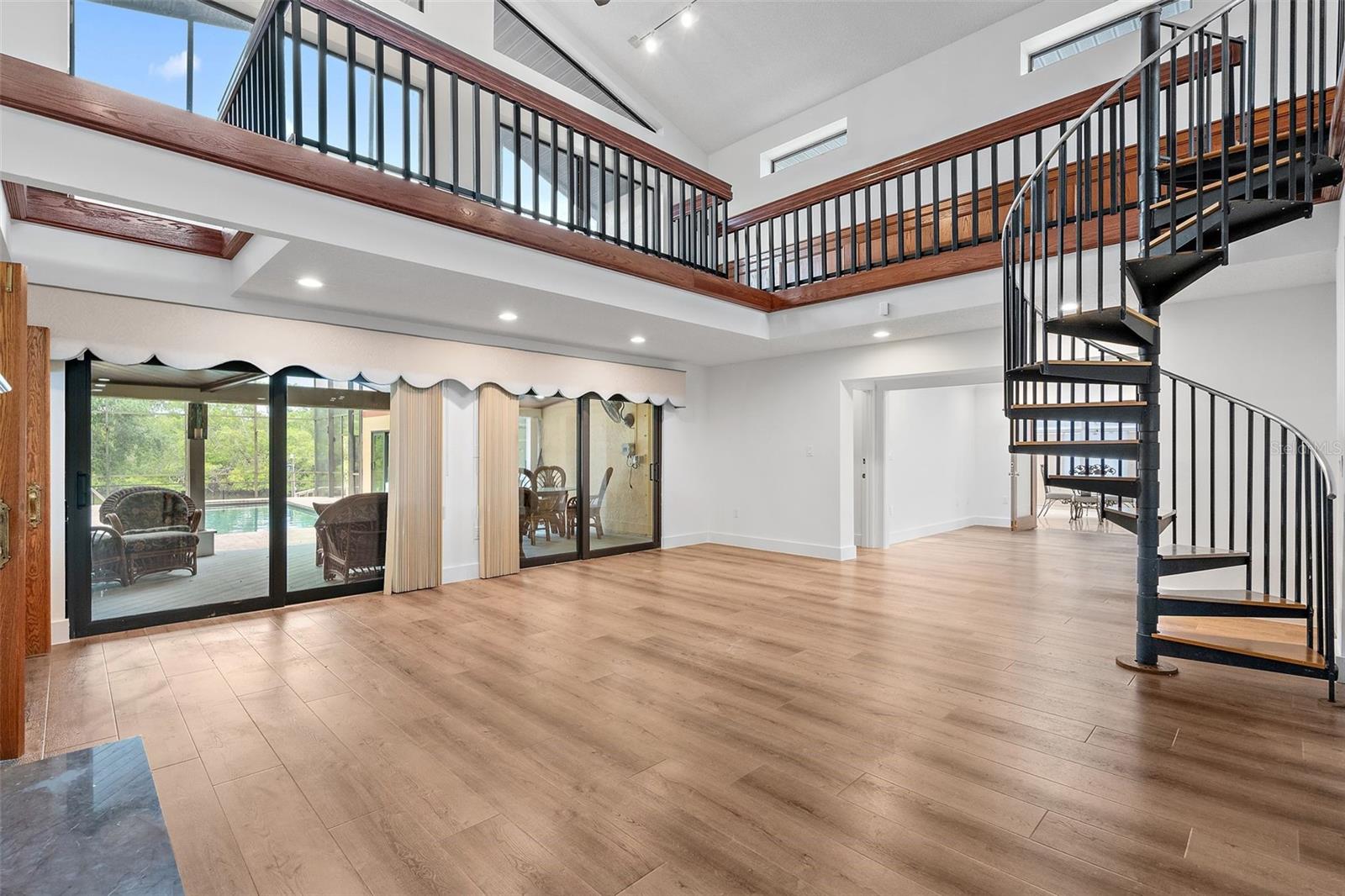 Soaring Ceilings in 25' x 20' Family / Entertainment Room - just off New KITCHEN
