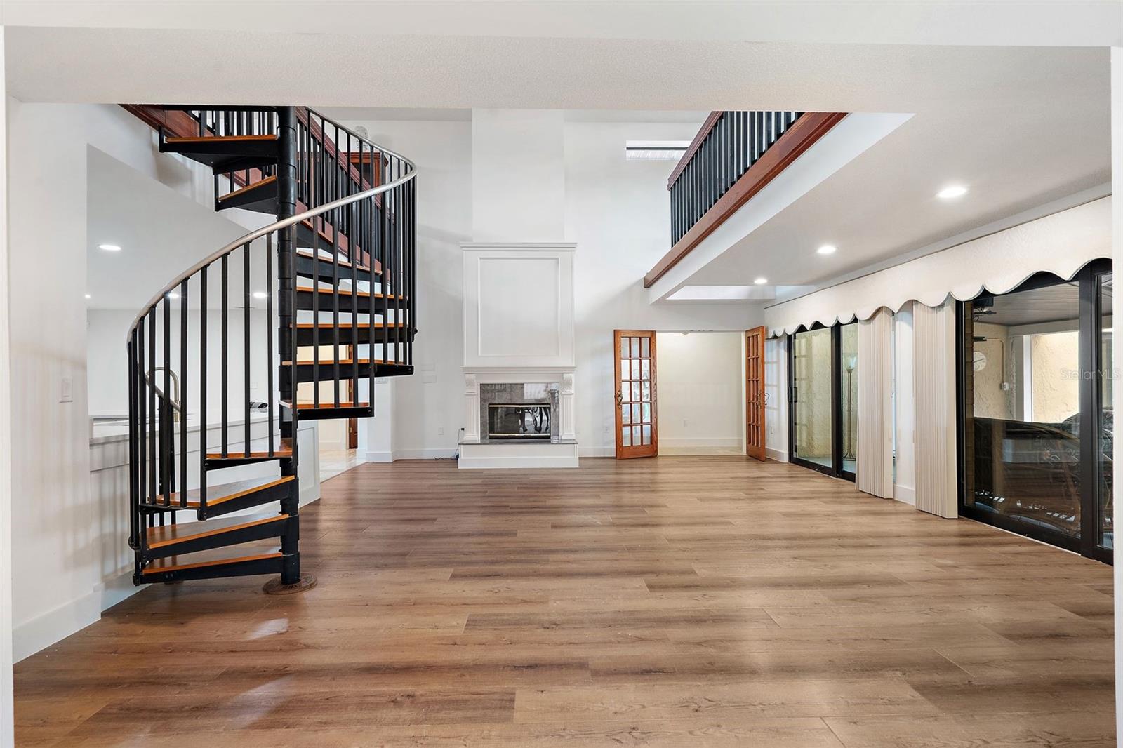 Soaring Ceilings in 25' x 20' Family / Entertainment Room - just off New KITCHEN
