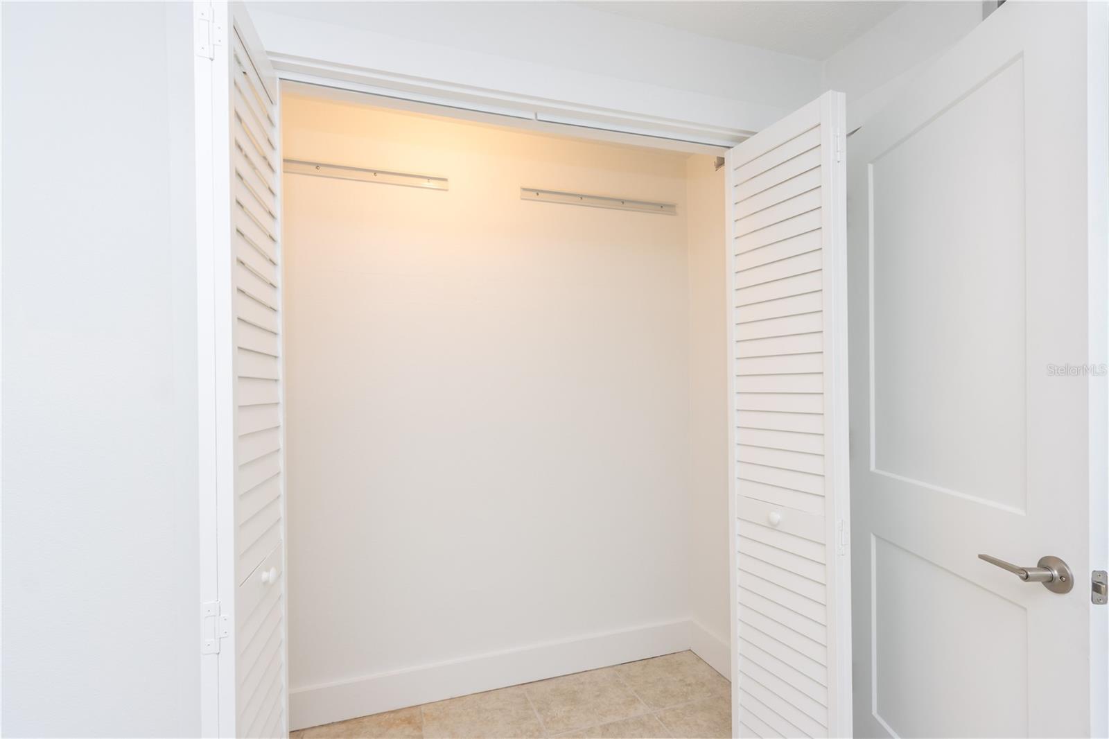 PRIMARY BEDROOM CLOSET