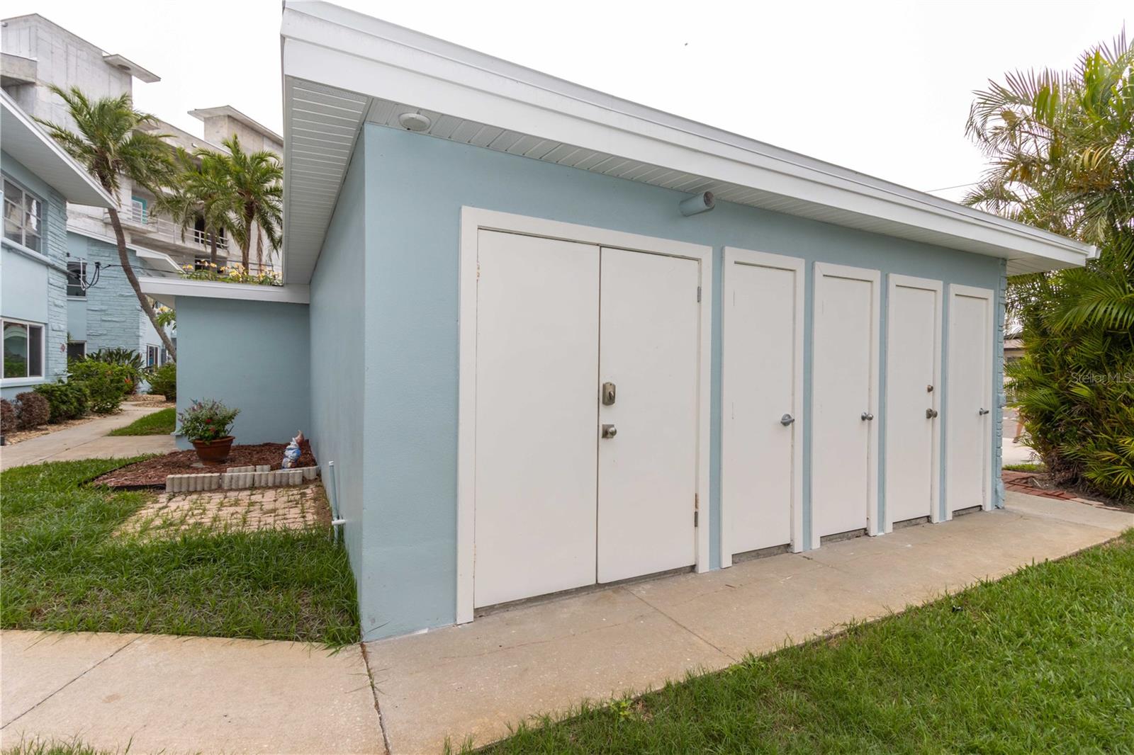 ON LEFT IS COMMUNITY WASHER AND DRYER