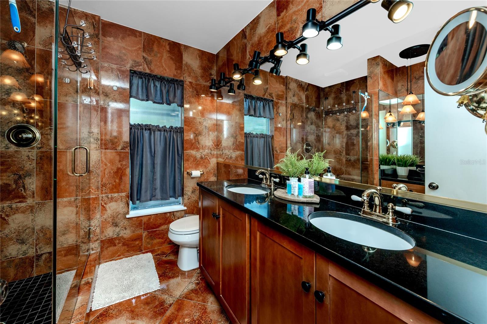 Primary bath with dual vanity and walk-in shower