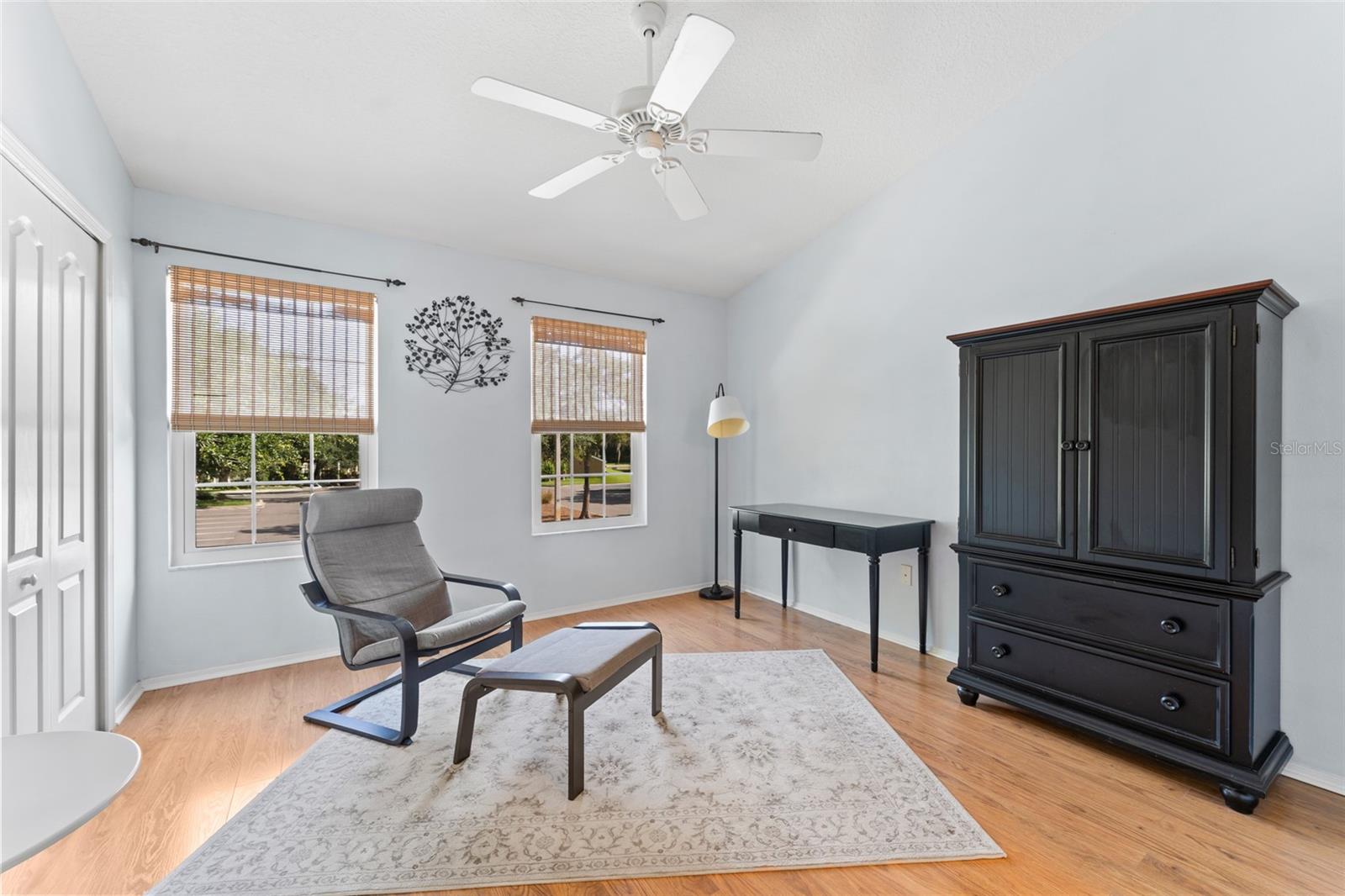 Second primary bedroom on front upstairs; vaulted ceiling w/fan