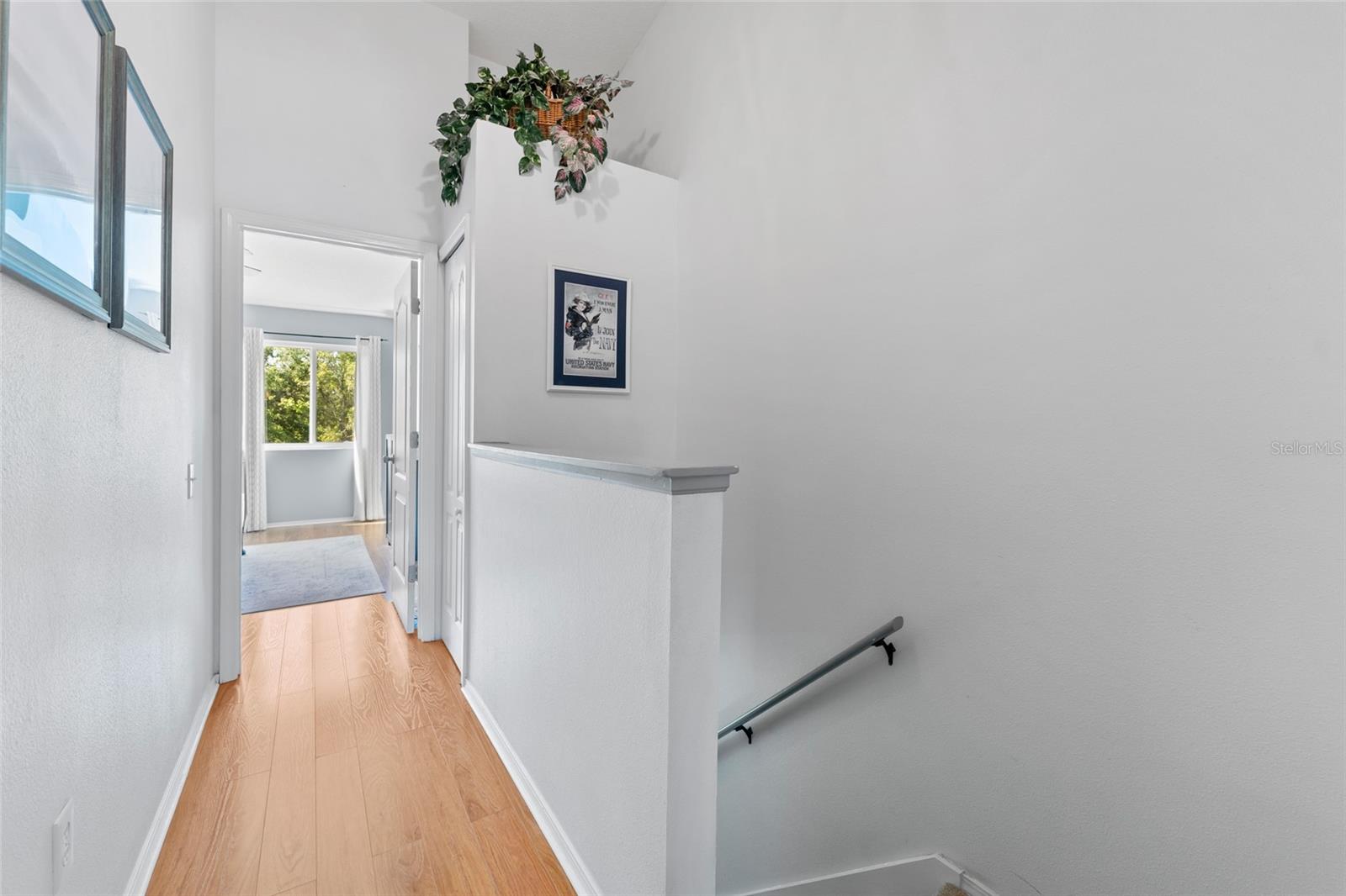 Hallway leads to Primary Bedroom, Lovely LV floors