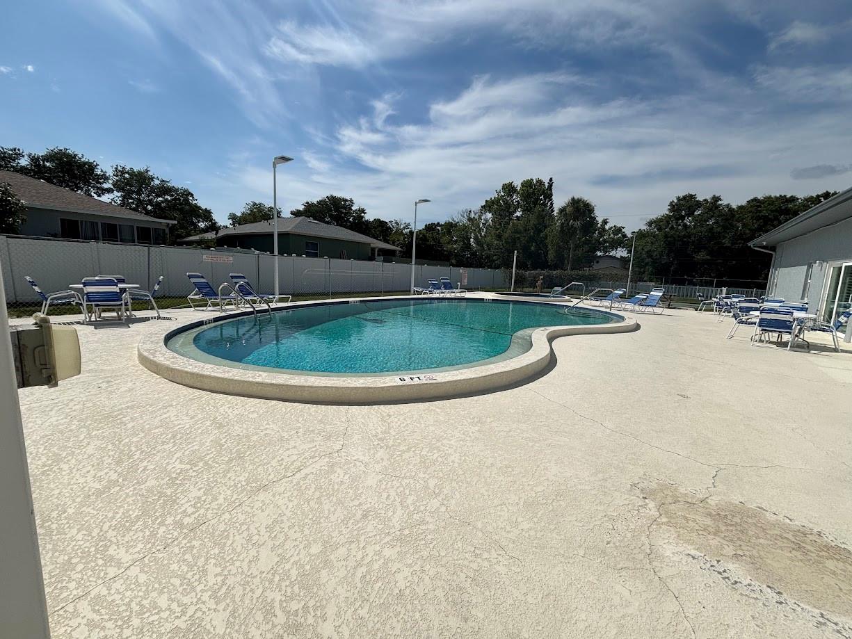 Pool area with spa and clubhouse