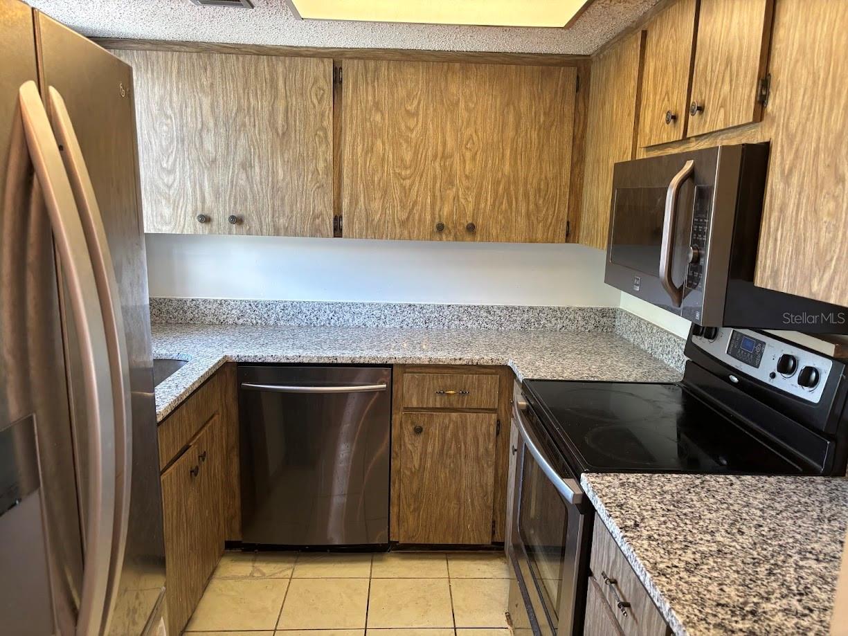 Kitchen with granite countertops