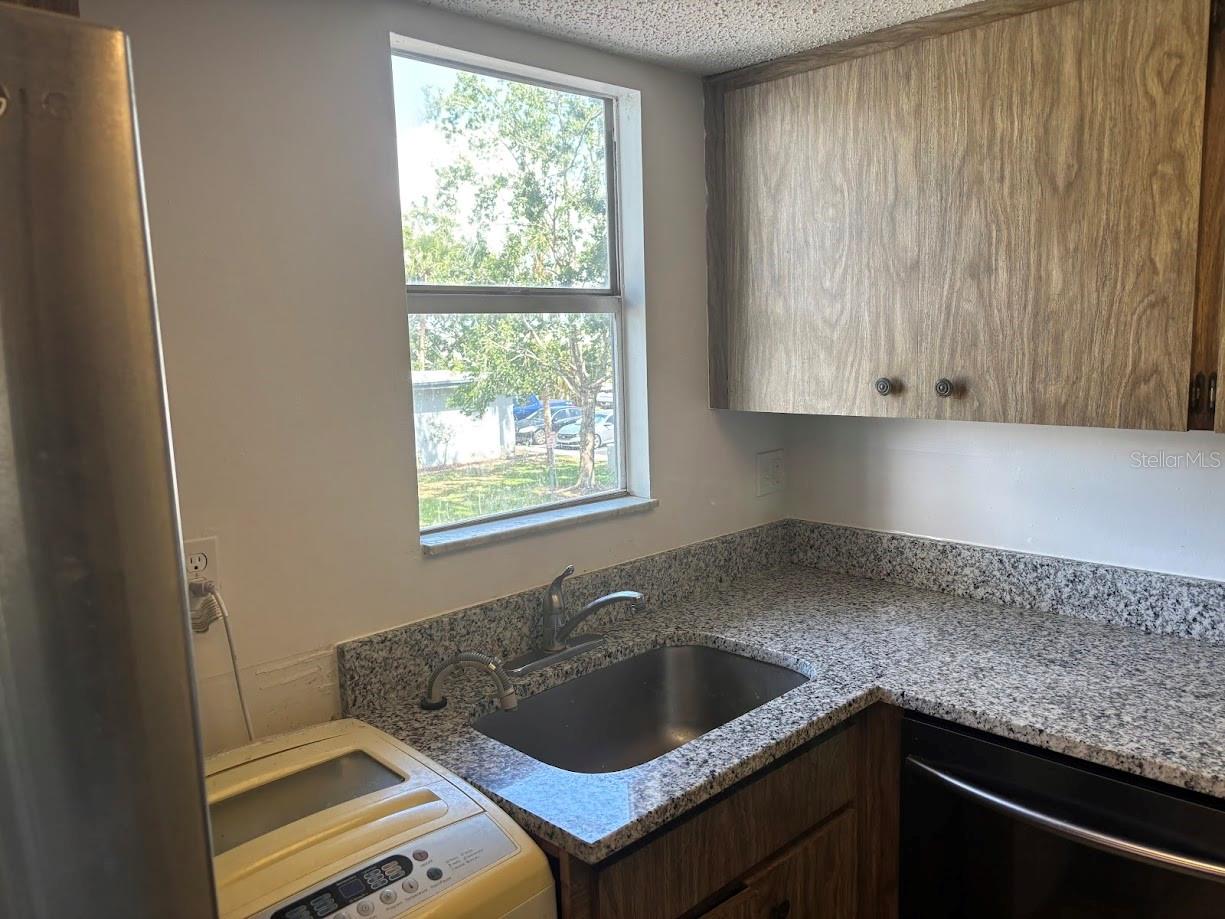 Remodeled kitchen with washing machine