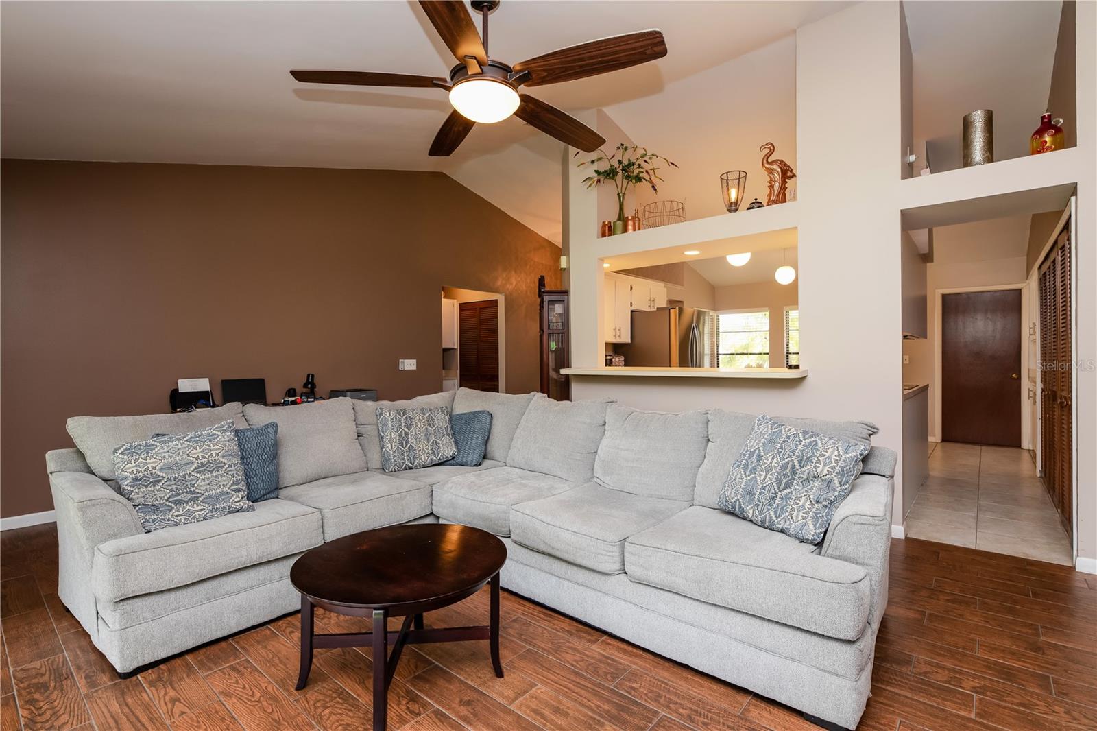 Open Living Space with panoramic views of pond and large backyard