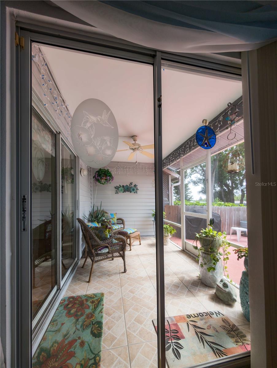 Sliding doors to patio from Primary bedroom