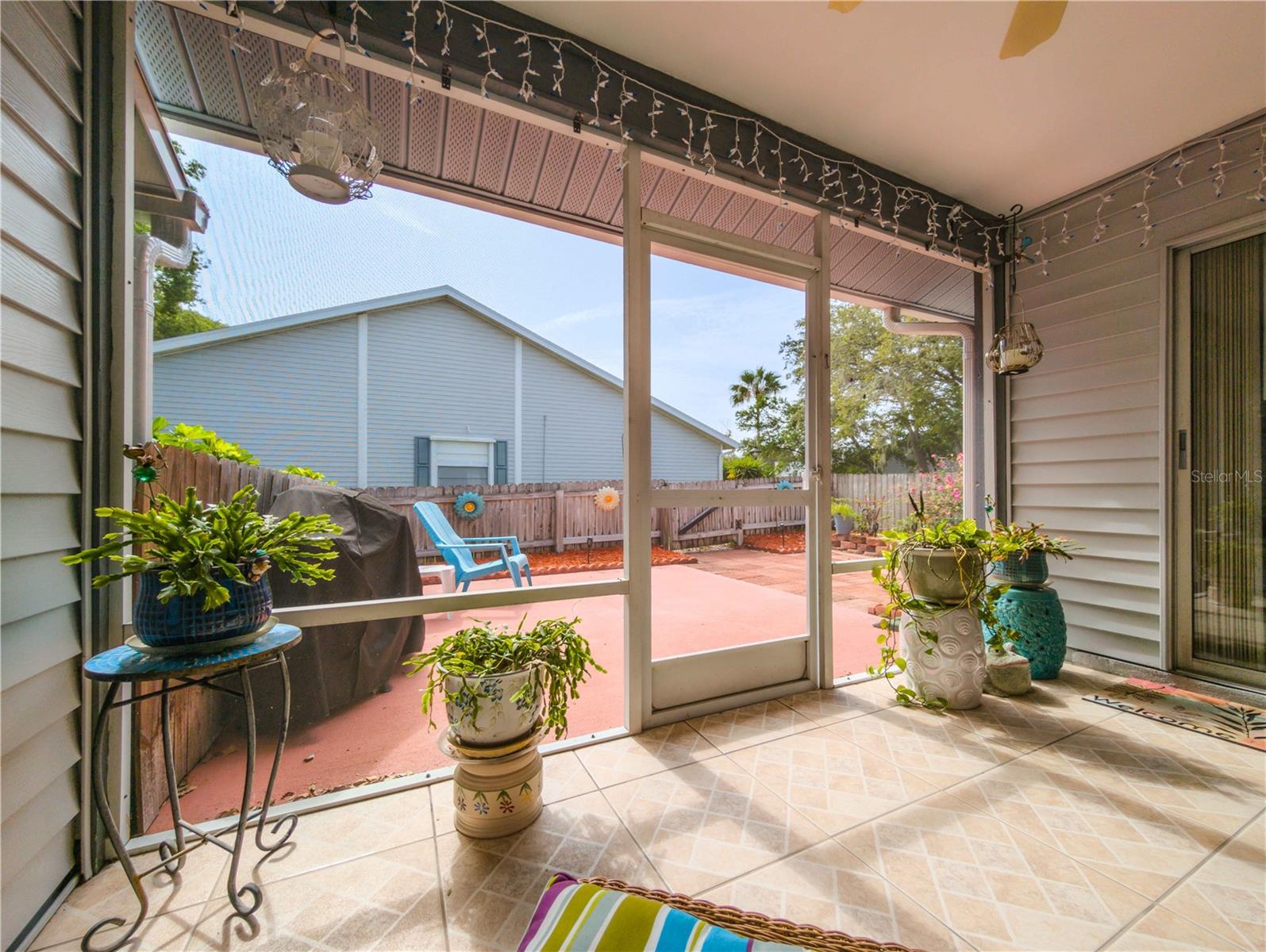 Come and sit a while in your screened patio