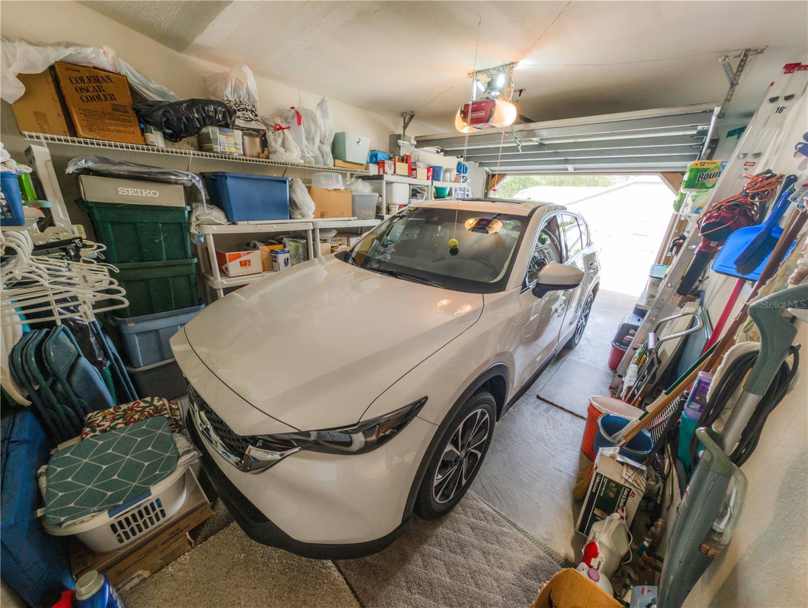 Garage has room for a vehicle and storage