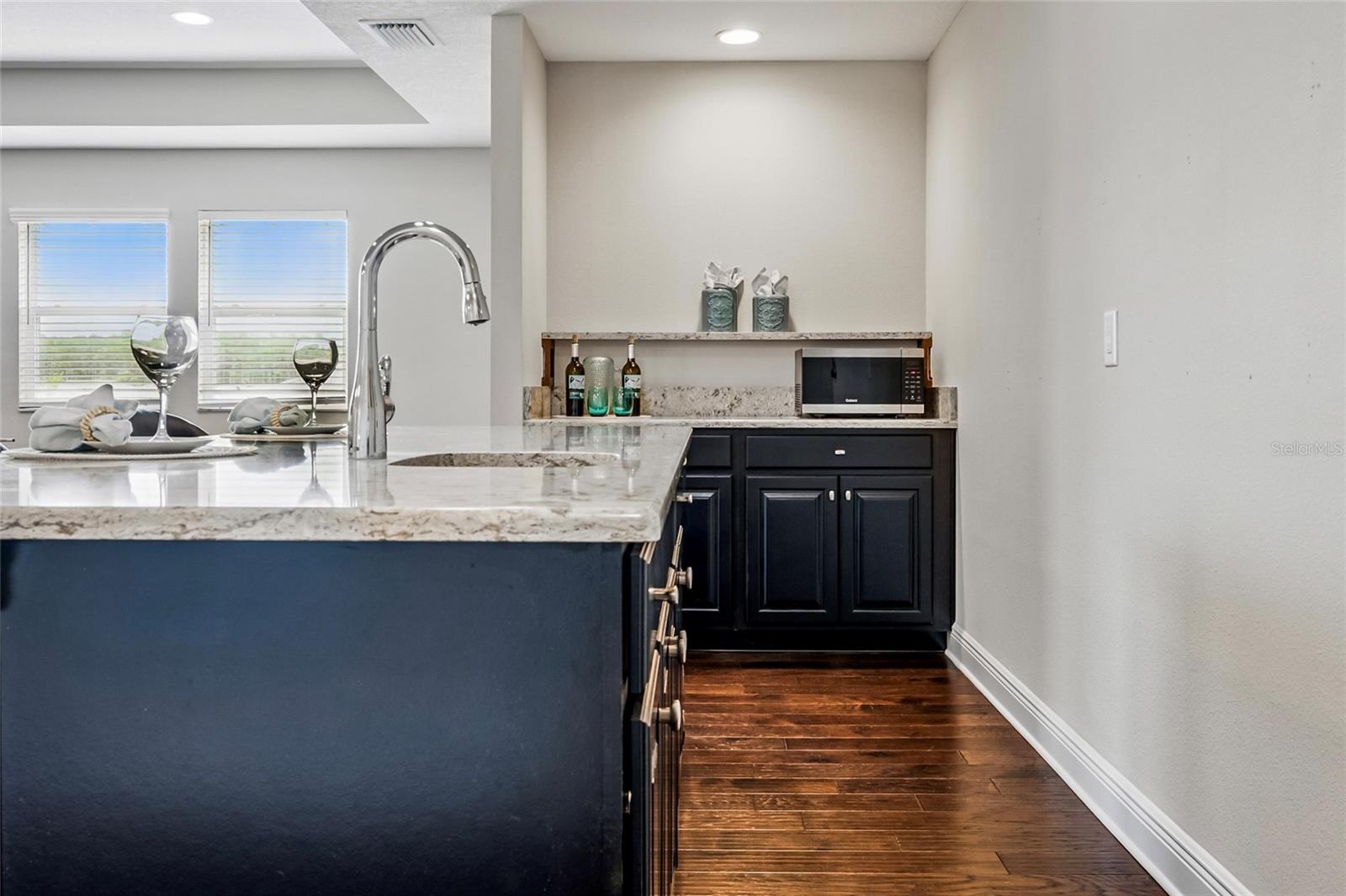 Full wet bar with wine refrigerator