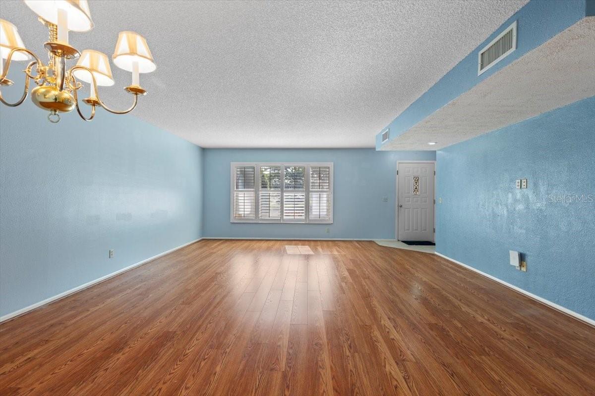 View of Front Living Room with big window with shutters