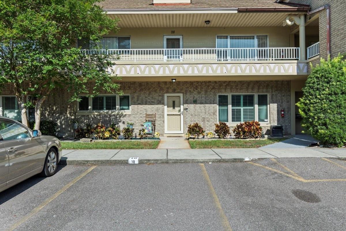 One parking spot for unit in front of the door