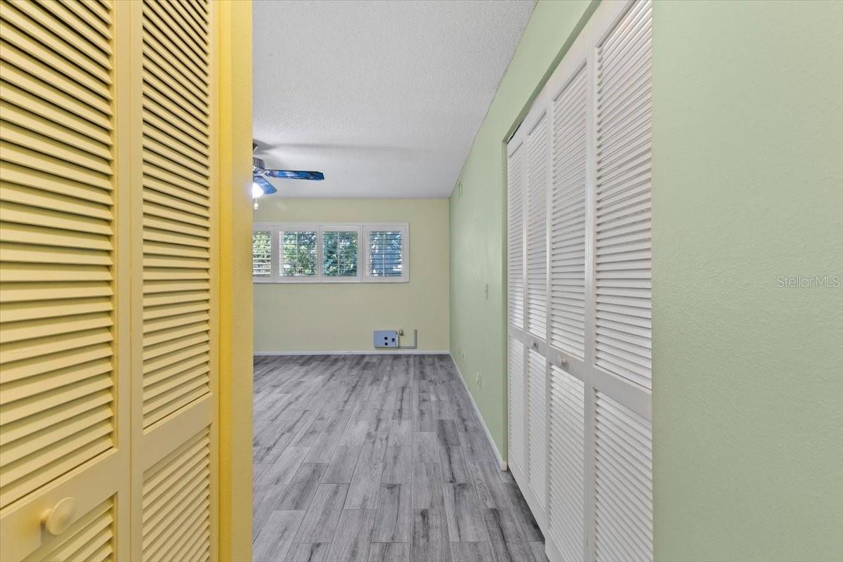 View of two (2) closets in Primary Bedroom.  One is walk in and second is closet.