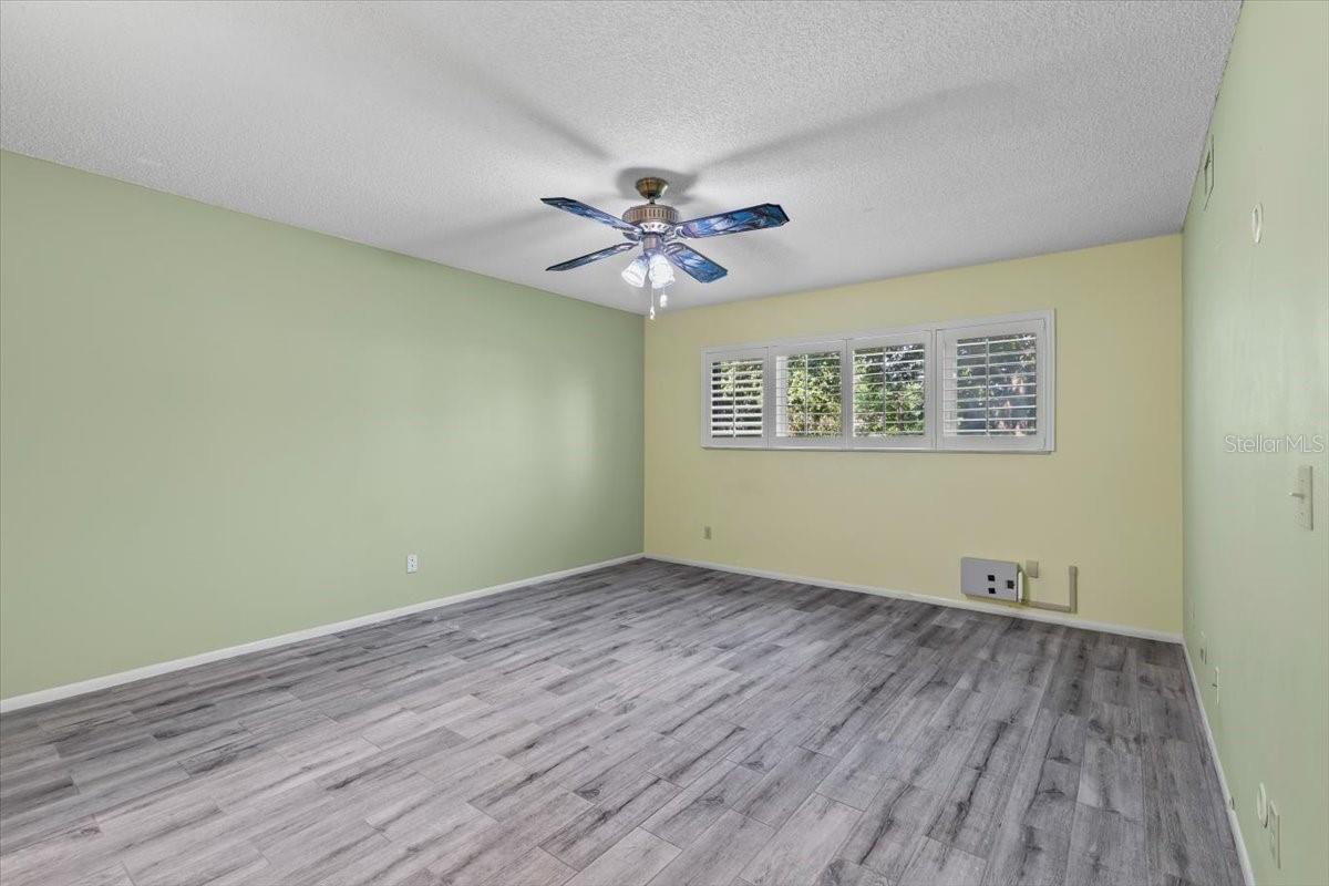 Primary Bedroom, with wood like tile