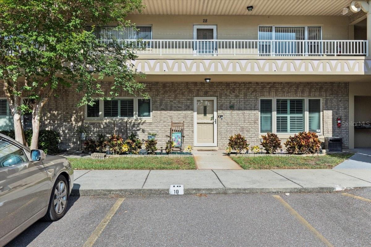 One parking spot for unit in front of the door