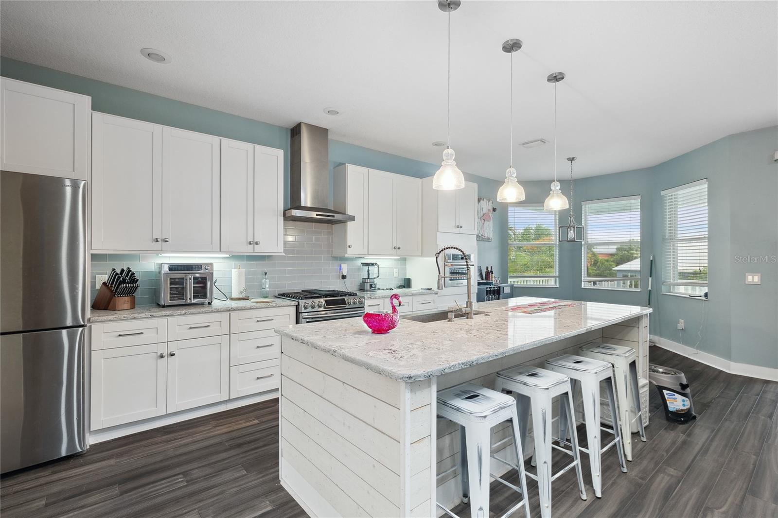 Kitchen featuring custom pantry shelving for a touch of style and organization.