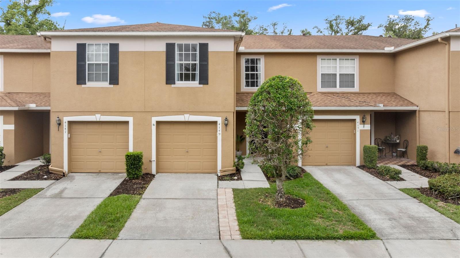 Private driveway, private garage, tidy landscaping, covered entry and a new roof!