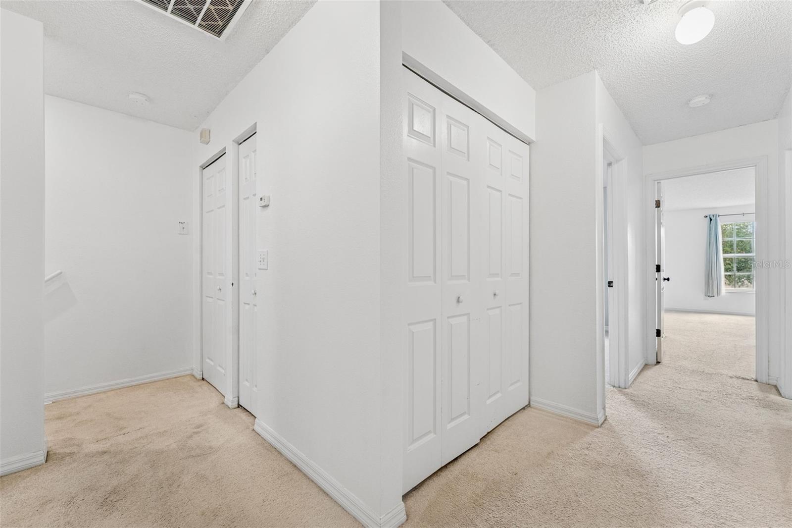 Split floor plan evident on the second level landing, laundry is also within that closet.