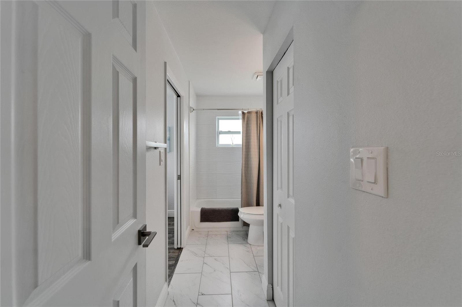 Your 2nd bathroom off main living area with additional storage and ensuite to your 2nd bedroom.