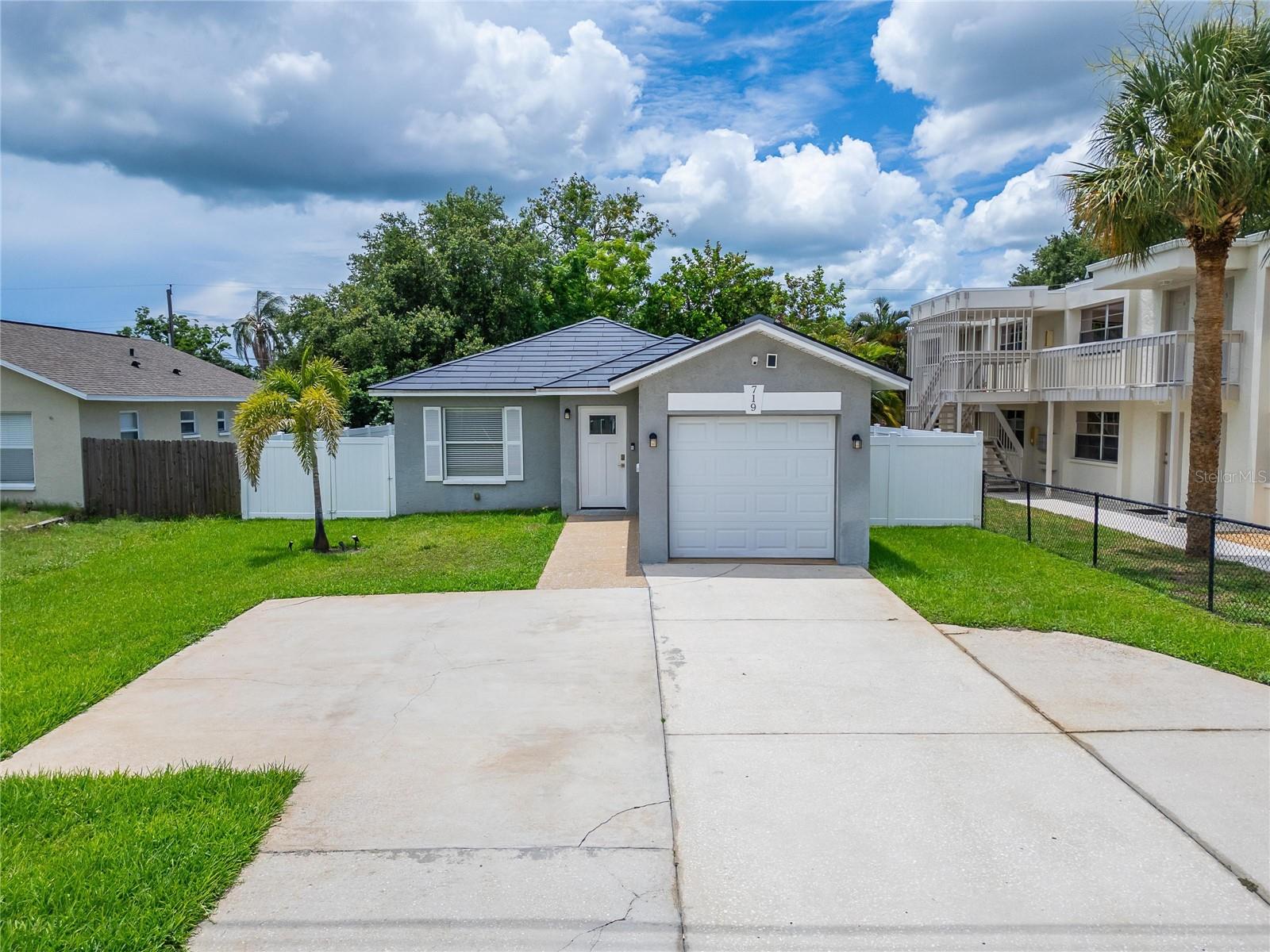 Plenty of room for 3 vehicles in driveway plus 1 in garage, equipped with EV Charger.