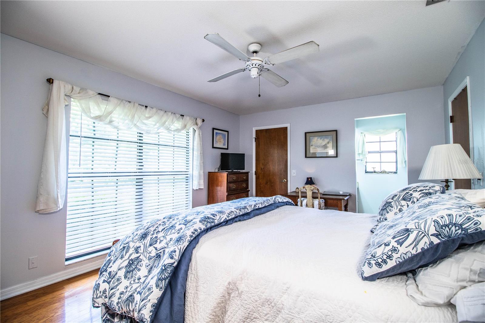 This oversized primary bedroom blends comfort and function with its en suite bath, dual closets, and cozy atmosphere—your perfect end-of-day escape.