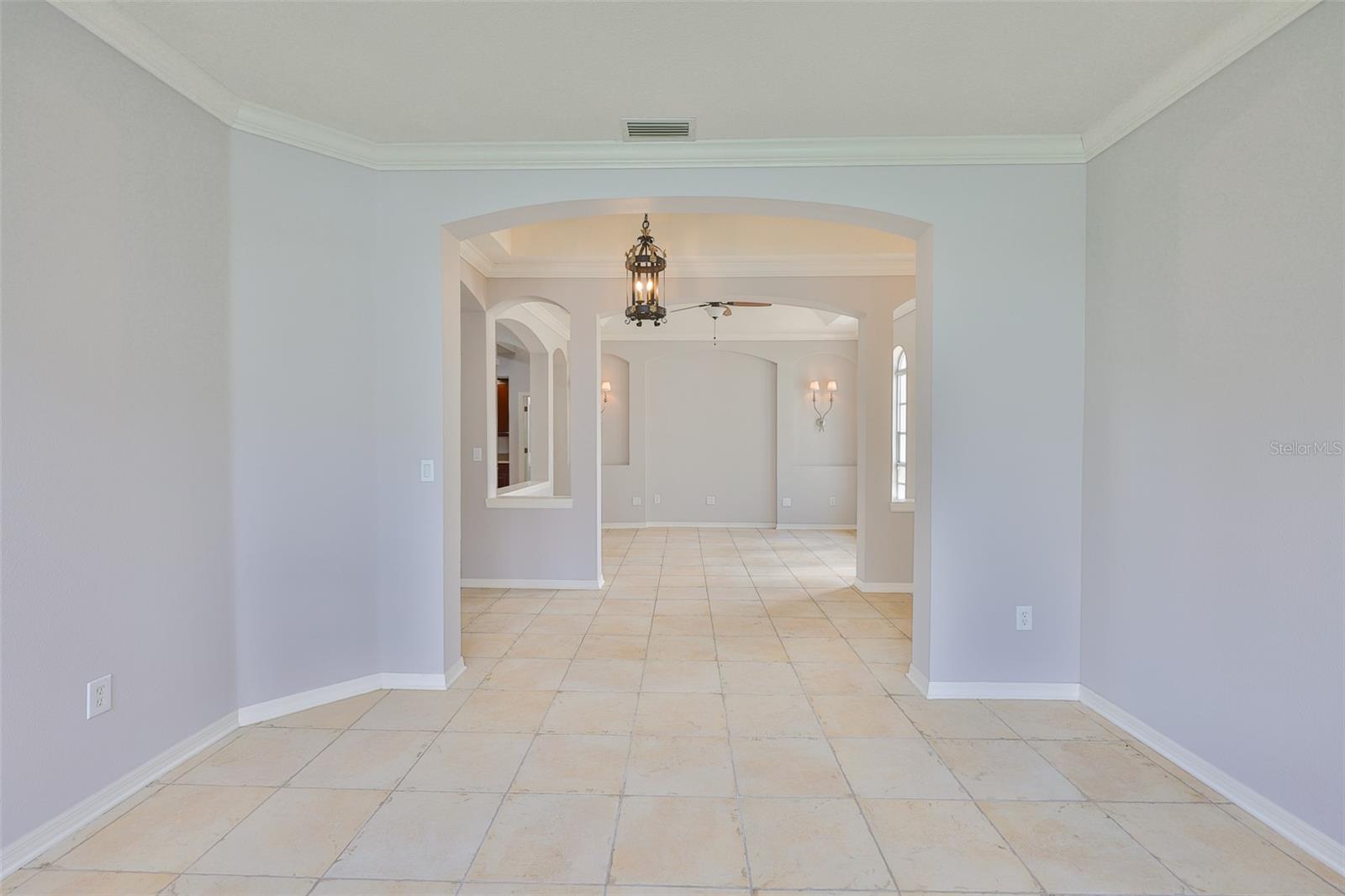 Foyer and dining room from den/study