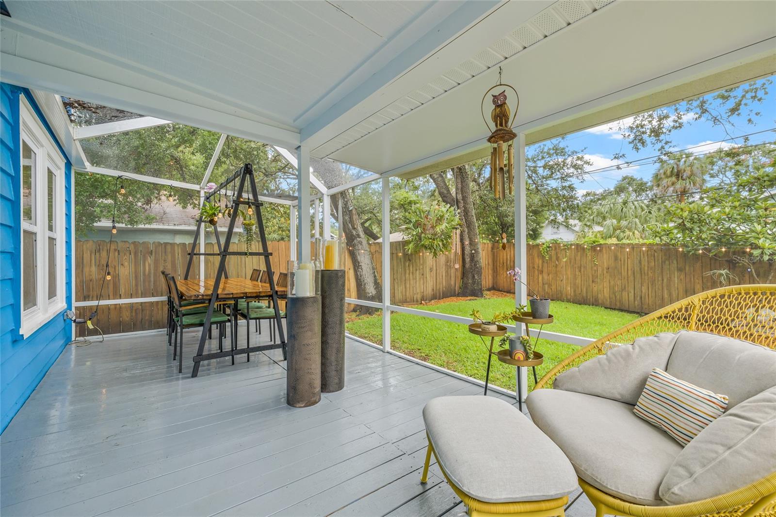 Unwind in this tranquil outdoor lounge space overlooking your private, fenced backyard.