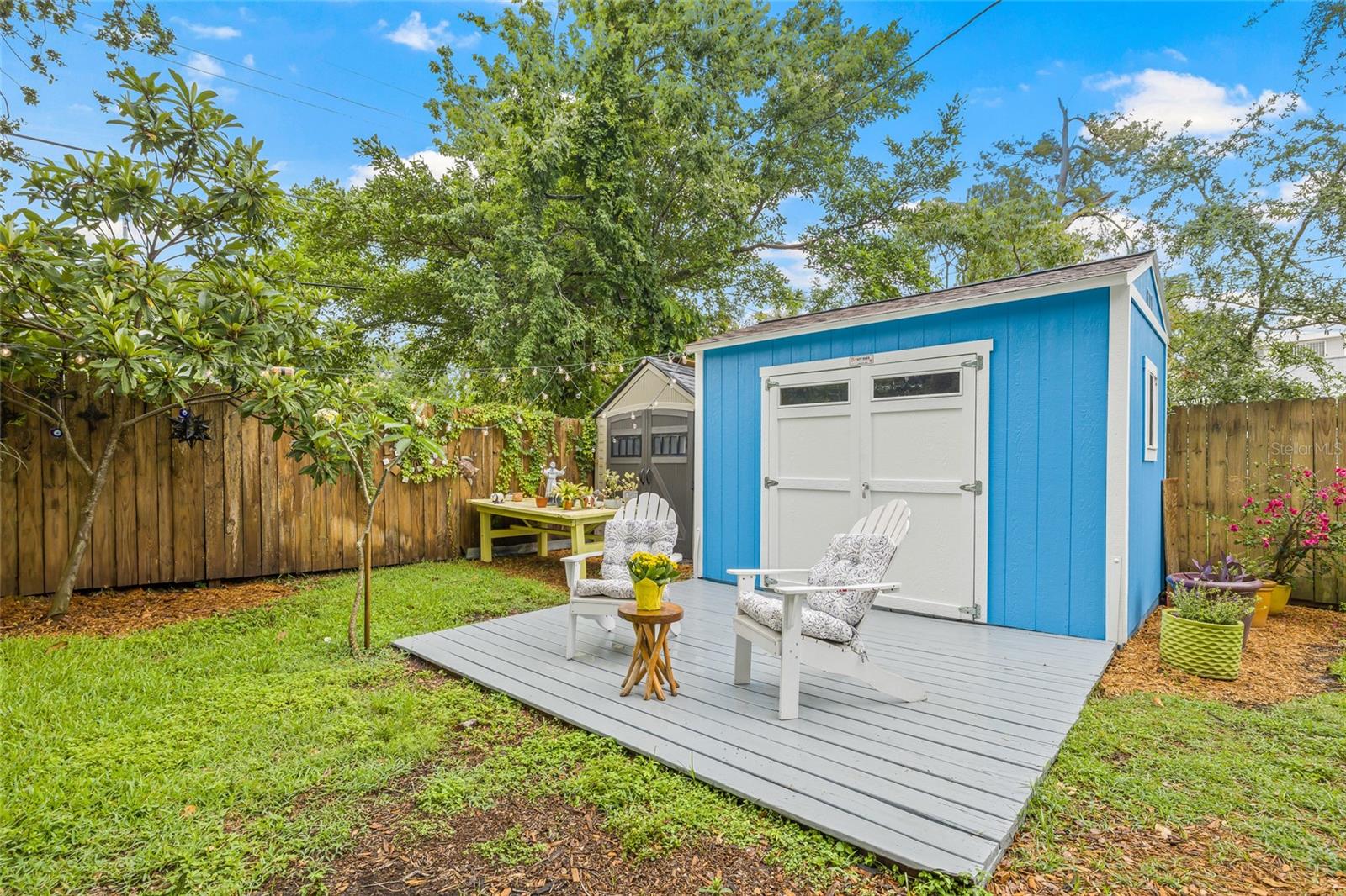 The dual sheds offer plenty of secure space for added storage.
