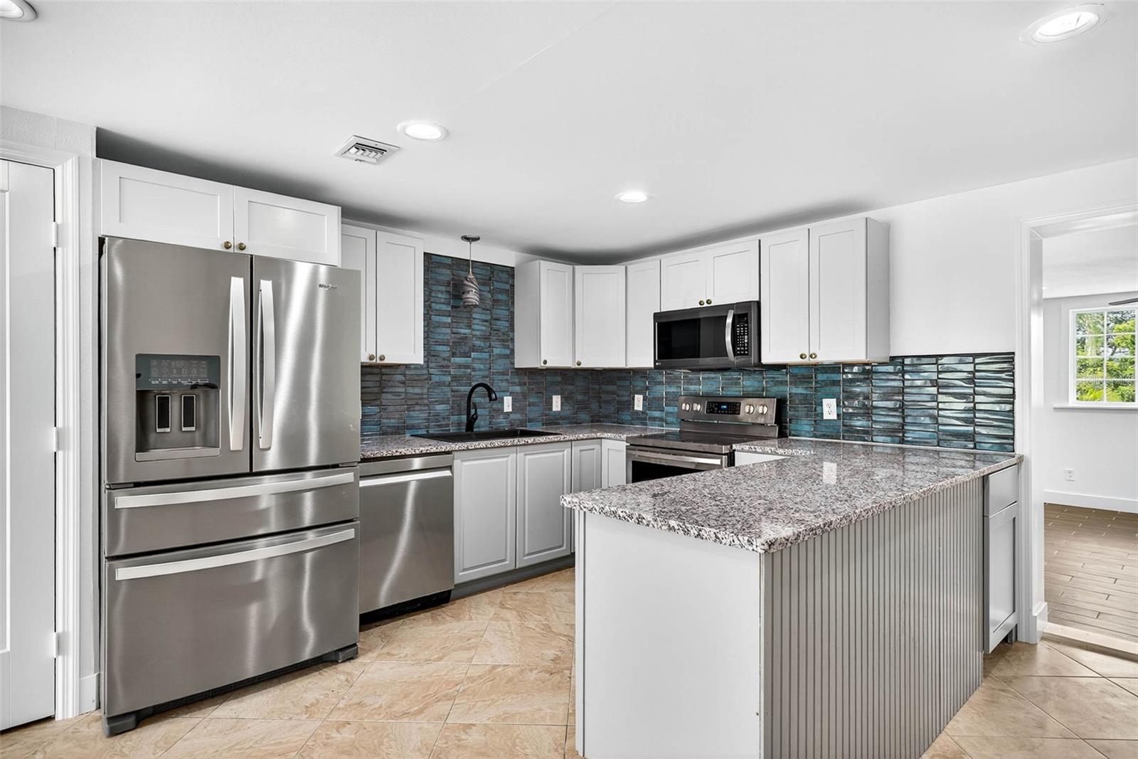brand new kitchen and stainless appliances