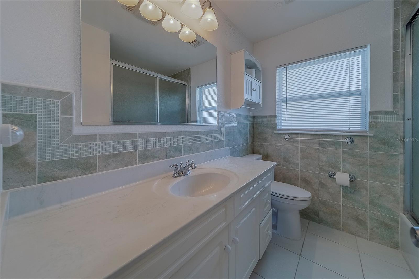 Bathroom 2 has a large vanity