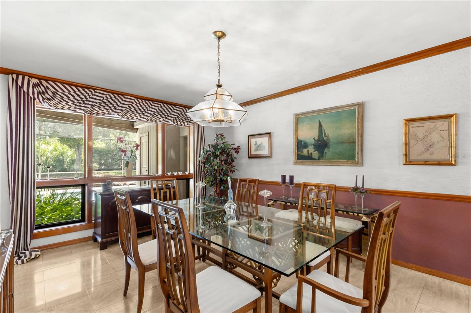 FORMAL DINING ROOM OVERLOOKING POOL