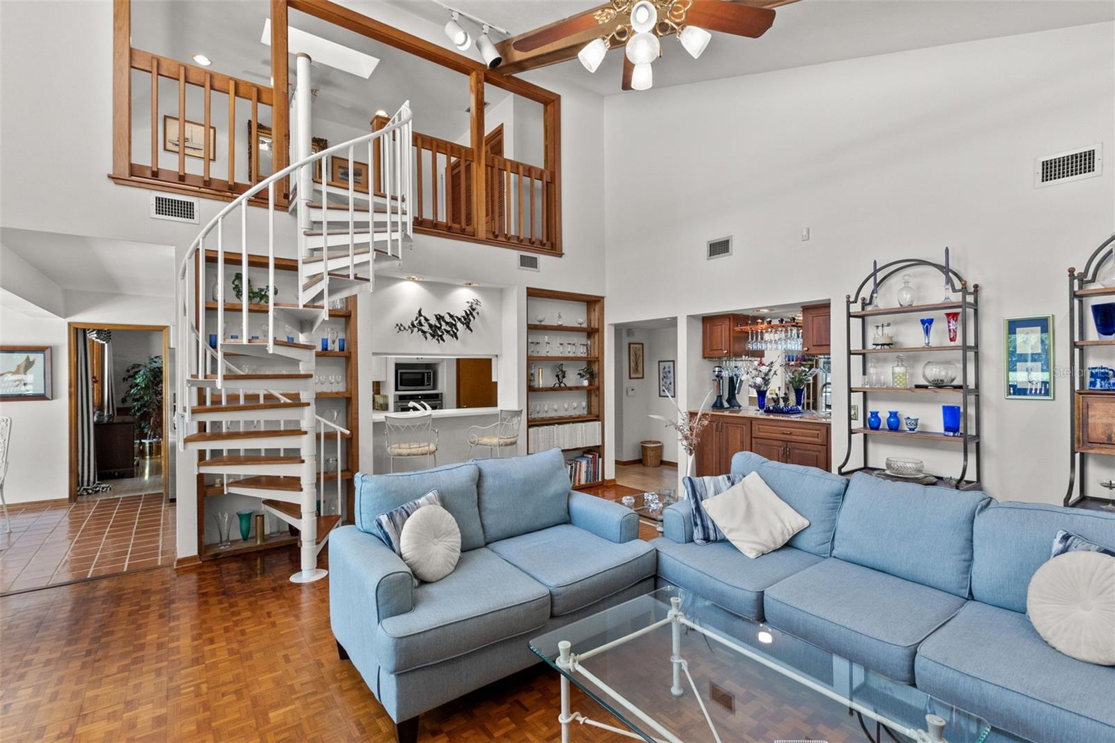 FAMILY ROOM/WITH SPIRAL STAIRCASE TO LOFT