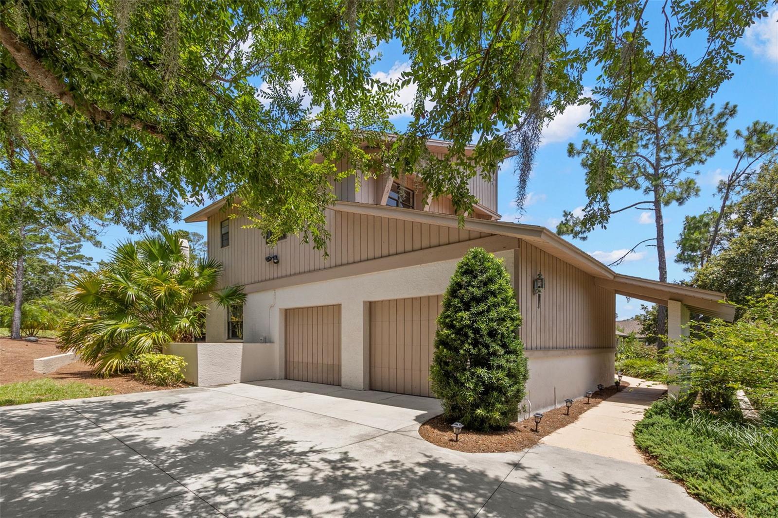 SIDE VIEW AND 2 CAR GARAGE
