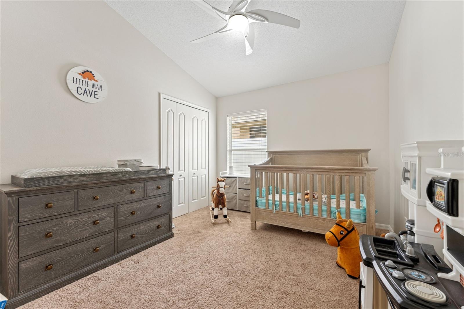 Guest bedroom 1 is adjacent and with an entry to primary suite (Great for an office or nursery, yet with a second hall entry it can be closed to the primary and used only as a secondary bedroom!)