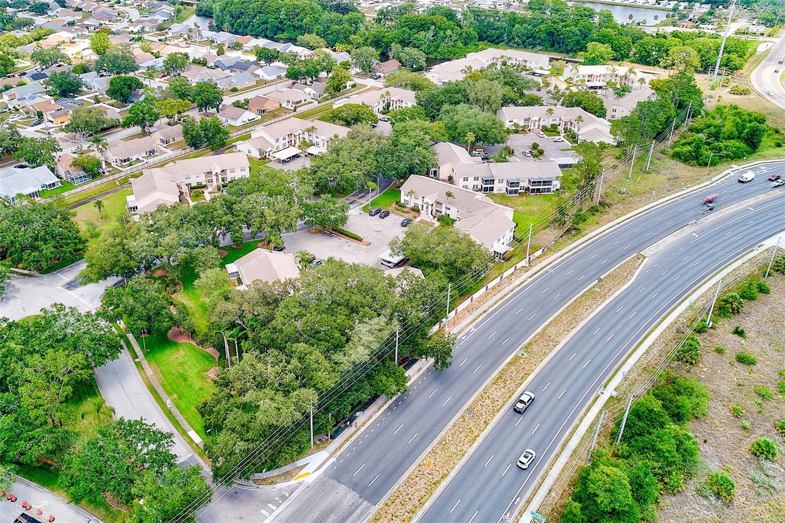 AERIAL TO SHOW HIGHWAY 54'S CLOSE ACCESS