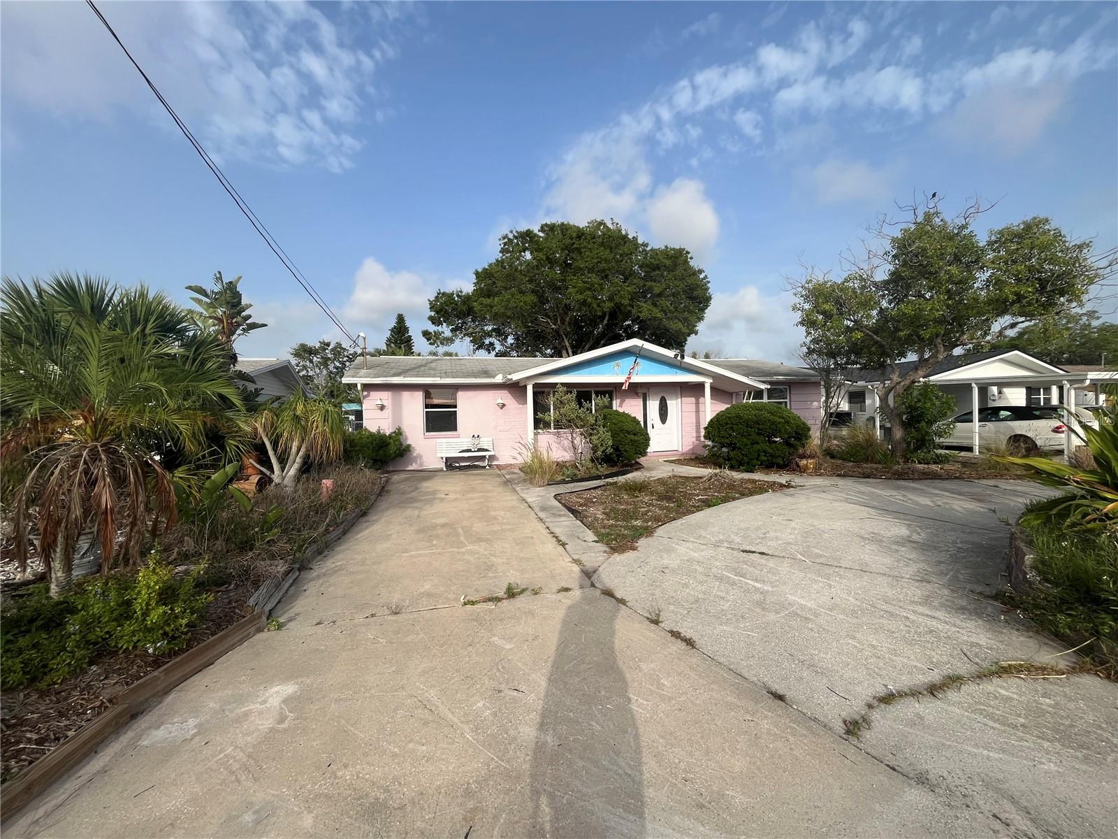 Front w/ circular driveway