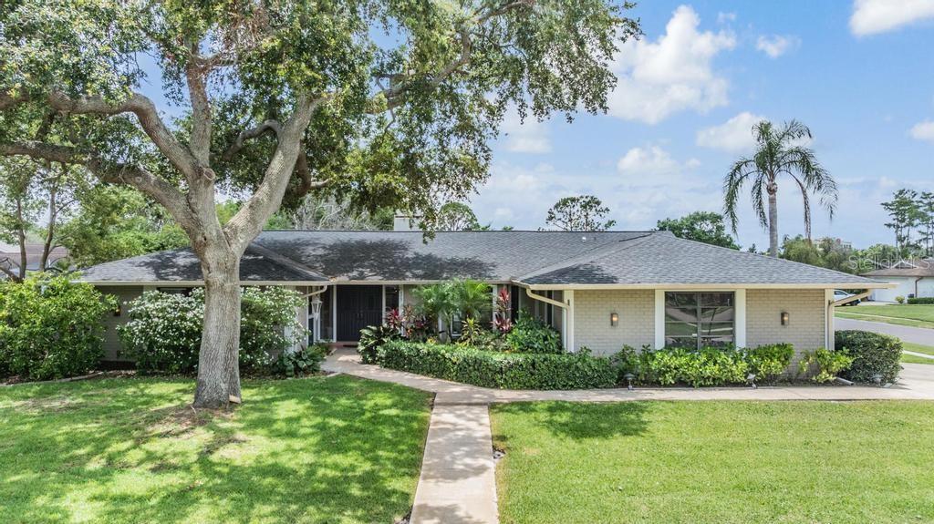 Welcome to 475 Holly Hill Rd 4/4 + Bonus/Office with on a large corner lot with attractive landscaping and front entry for eye -catching curb appeal