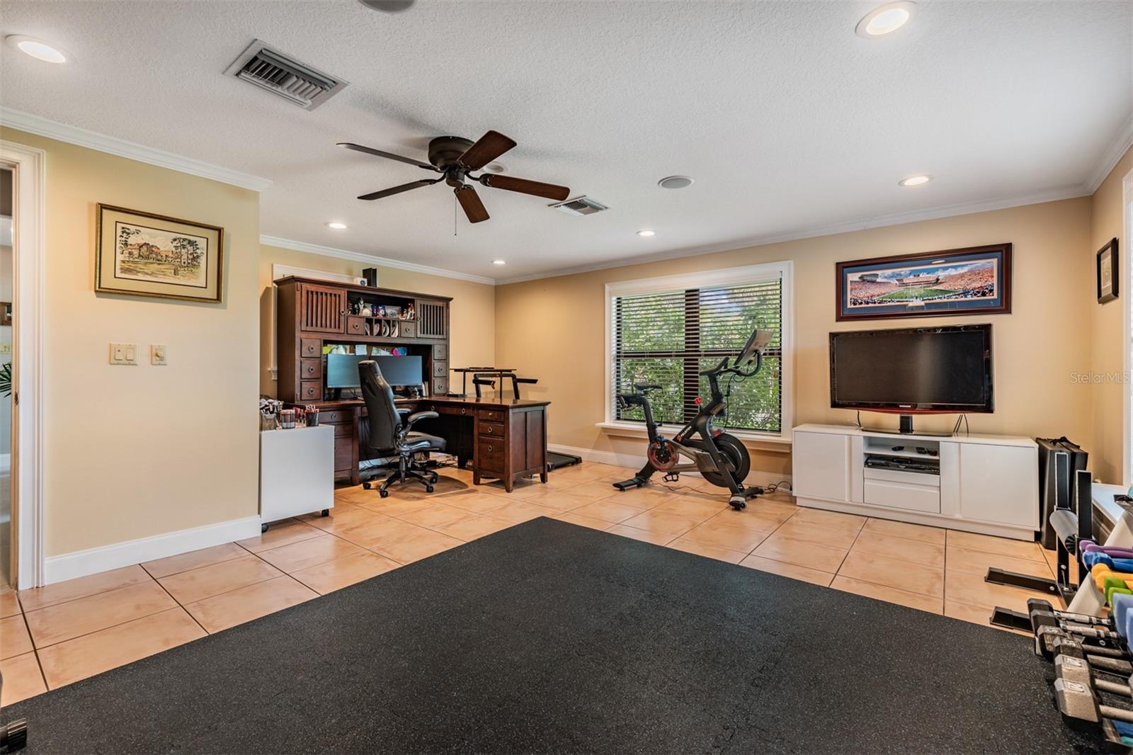 Ideally located just off the front entry, the spacious 20’x19’ bonus room offers incredible flexibility—perfectly suited to fit your lifestyle needs as a home office, fitness room, or playroom
