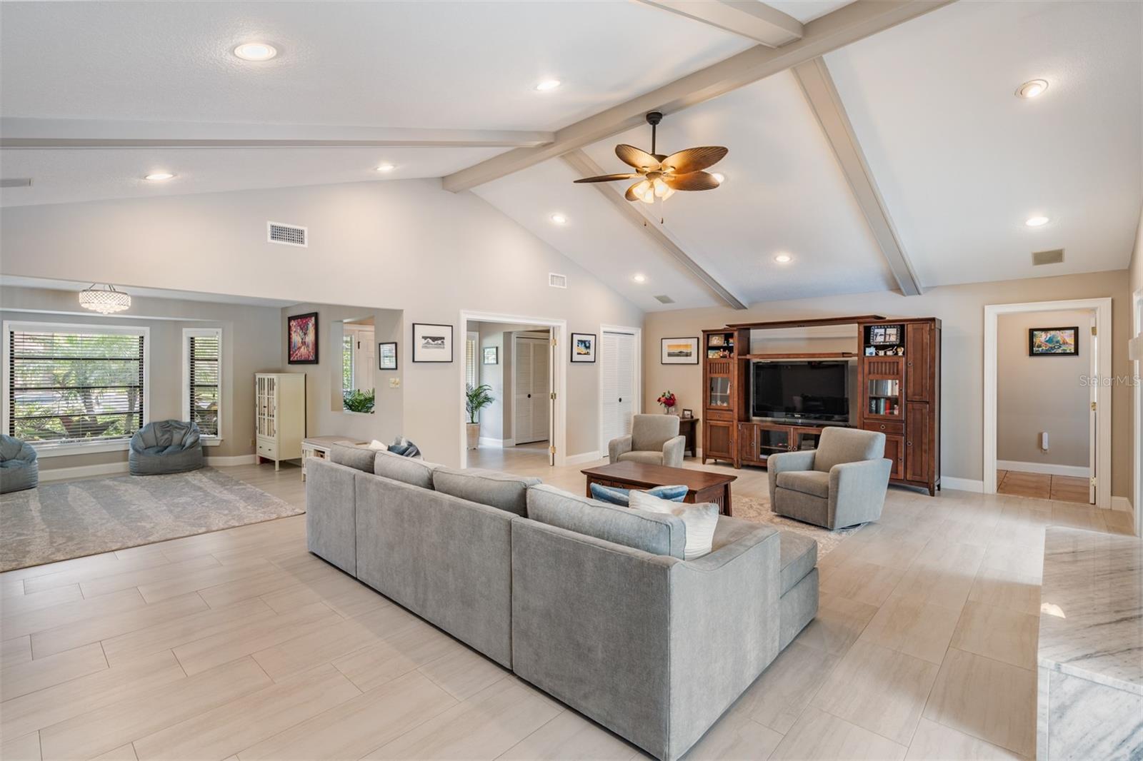 The living room and dining room form the heart of the home, offering an ideal space for everyday comfort and seamless entertaining