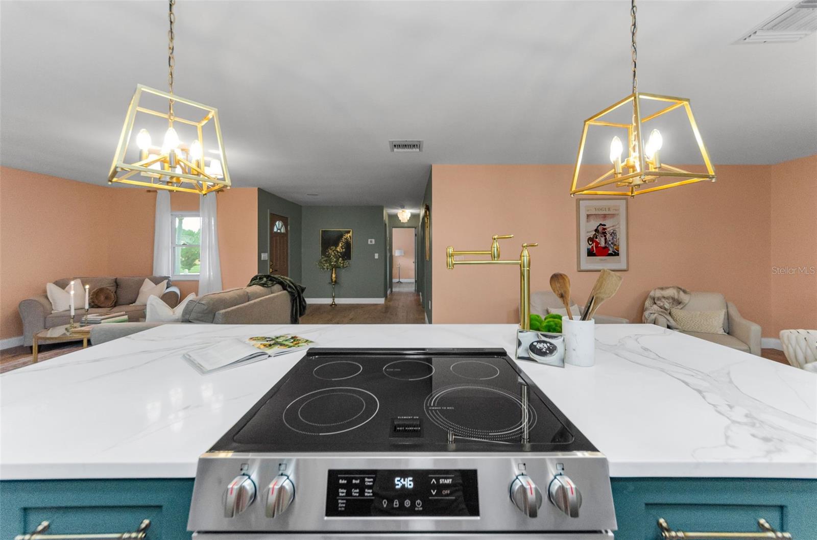 Spend time with your guests while you prepare dinner! Did you notice the Pot Filler!!!