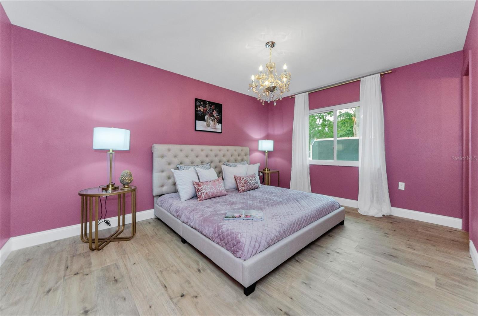 Modern meets vintage - Primary Bedroom w gorgeous chandelier