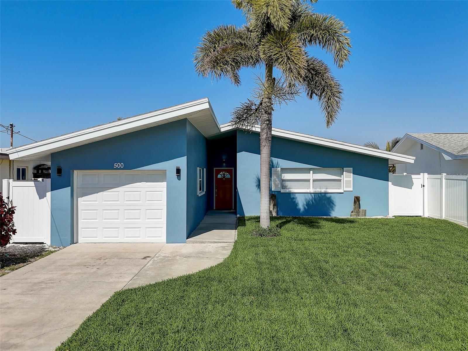 Front of home invites you to come in and see the views